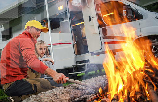 RV parked at a campground, showcasing the hidden costs of RV ownership, including nightly campground fees.